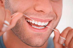 cómo utilizar el hilo dental